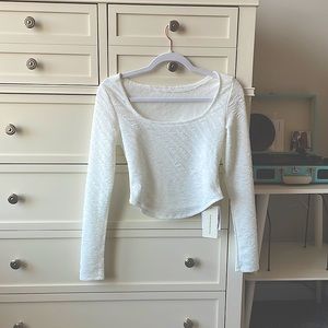 Long sleeve white crop top, size small from The Commense.
